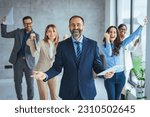 Small photo of Euphoric excited business team celebrate corporate victory together in office, happy overjoyed professionals group rejoice company victory, teamwork success win triumph concept at conference table