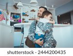 Military man father hugs son....