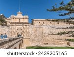 Small photo of Mdina Gate, also known as the Main Gate or the Vilhena Gate, is the main gate into the fortified city of Mdina, Malta