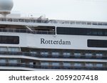 Small photo of Ijmuiden, The Netherlands - october 17th, 2021: MS Rotterdam operated by Holland America Line, in North Sea Canal towards Amsterdam, starting her maidentrip. Detail of name and balcony staterooms.
