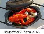 Lobster Dinner In Black Dish On ...