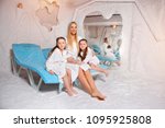 Mother with two children in salt room. Halotherapy for treatment of respiratory diseases.