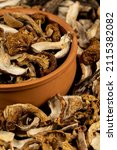 mix dried mushrooms in clay... | Shutterstock . vector #2115382082