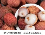 fresh peeled lychee fruits in... | Shutterstock . vector #2115382088
