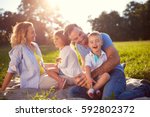 Young family with children having fun in nature 
