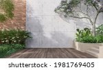 Empty exterior concrete wall with tropical style garden 3d render,decorate with tropical style tree ,sunlight on the wall