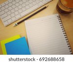 Small photo of Time to work, jot down you idea before work, start with to do list or share your innovative idea in the morning. be prepare for the working day. note you idea in the note book. Create to do list