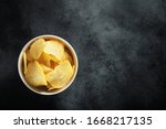 Crispy Potato Chips In A White...