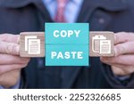 Small photo of Concept of copy and paste computer files. Operations of electronic documents or archive: COPY or PASTE. Perfect copy-paste. Plagiarism.