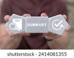 Small photo of Man holding white blocks sees word: SUMMARY. Summary business finance concept. Summary financial report document analysis and business review.