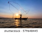 Fishermen Cast Net Into The...