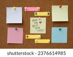 Small photo of collection of colorful variety post note paper note reminder sticky notes pin paper blue on cork bulletin board. empty space for text.