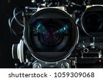 Close up shot of cinema lens with lot of equipment for filming cinema or movie in a division filming. Cinema lens. Photo lens.