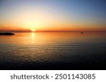 A stunning sunset signals the end of a long summer day at Lake Erie, Pennsylvania.