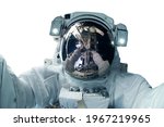 Astronaut in a spacesuit isolated on a white background. Elements of this image were furnished by NASA. High quality photo