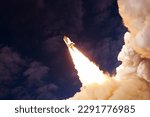 Rocket launch into outer space. Elements of this image furnished NASA. High quality photo