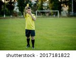 Soccer referee to point out a...