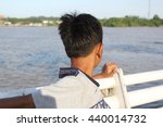 Small photo of Asian boy eschew from camera and shy looking his face