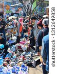Small photo of Seoul, Korea - March 7, 2015 : crowd of tourist shopping at Hongdae Free Market located on Hongdae street, Free Market is a marketplace for young artists and sells only genuinely creative artwork