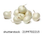 Heap of fresh raw pearl onions close up isolated on white background 