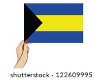 a womans hand holding the flag... | Shutterstock .eps vector #122609995
