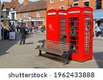 Two Red Telephone Boxes And A...