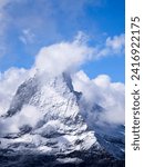 Small photo of The Matterhorn - Cervino - is a mountain of the Alps, straddling the main watershed and border between Italy and Switzerland. It is a large, near-symmetric pyramidal peak, whose summit is 4478 meters