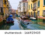 Boats on canal in Venice, Italy