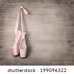 New pink ballet shoes hanging...