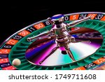 Roulette wheel close up isolated on black background - Selective Focus
