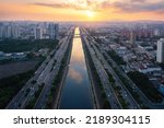 Small photo of Tiete River, Marginal Tiete Highway and Limao Bridge aerial view at sunset - Sao Paulo, Brazil