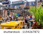 Small photo of Toronto, Ontario, Canada - June 6, 2018: The Distillery District, the old Gooderham and Worts, is a national historic site that encompass cafes, restaurants, shops and art galleries.