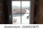 Small photo of Villegas, Burgos, Spain. February 10, 2023. Streets of Villegas, Burgos, Spain seen from a window.