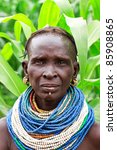 Small photo of OMA VALLEY, ETHIOPIA - AUG 14: Nyangatom woman posing in the village,the ethnic groups in the The Omo valley Could disappear Because of Gibe III hydroelectric dam. on Aug 14, 2011 in Omo Valley, Ethiopia.