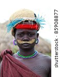 Small photo of OMA VALLEY, ETHIOPIA - AUG 11: Mursi woman posing in the village,the ethnic groups in the The Omo valley Could disappear Because of Gibe III hydroelectric dam on Aug 11, 2011 in Omo Valley, Ethiopia.
