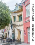 Small photo of Sopot, Poland - October 4, 2020: Crooked little house (Polish: Krzywy Domek) on the Heroes of Monte Cassino street.