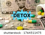 Double exposure. Puzzles depicting pills and dollars with the inscription -DETOX. The concept of medicine.