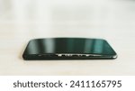 Small photo of Mobile phones with screen problems caused by swollen batteries, expiry battery. Li-polymer battery in phones. selective focus.
