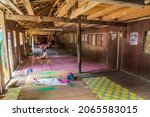 Small photo of SARAWAK, MALAYSIA - MARCH 2, 2018: Common area of a traditional longhouse near Batang Rejang river, Sarawak, Malaysia