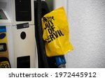 An empty pump at a gas station is covered with a yellow plastic bag following a cyber attack on the Colonial Pipeline. 