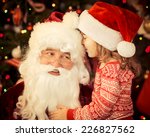 Santa Claus And Child At Home....