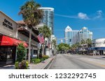 Small photo of FORT LAUDERDALE, FLORIDA - JULY 14 - A street view of buildings and retail shops along the main drag on July 14 2018 in Fort Lauderdale Florida.