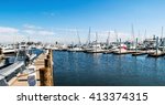 A Panoramic View Of A Marina...