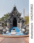 Small photo of Chiang Mai, Thailand - Mar 21st, 2018 - The front of Wat Sri Suphan Temple, known as the Silver Temple, in Chiang Mai. The Silver Temple was built and decorated by silver handicraftsmen in 12 years.