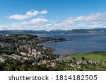 Scenic view of the town and harbor of Gourock in Inverclyde in Scotland. Blue sky, sunny day in the Greenock area.