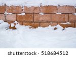 Red Brick Wall Under Snow In...