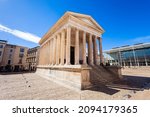 Small photo of Maison Carree is an ancient roman temple building in Nimes city in southern France