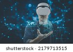 Small photo of Businessmen use Metaverse technology. that help facilitate users to be able to connect around the world, Assisted Reality, Augmented Reality (AR), Meatspace, Multiverse, NFT, Virtual Reality