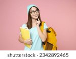 Small photo of Pensive woman student in blue t-shirt hat eyeglasses backpack hold notebooks put hand prop up on chin isolated on pink background studio portrait. Education in high school university college concept