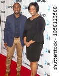 Small photo of EJ Gaines and Monica Coates (L-R) attends the ASCAP and Motown Gospel "Morning Glory" Breakfast at the Mandarin Oriental Hotel on March 24th, 2018 in Las Vegas, Nevada - USA